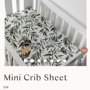 Babyletto Mini Crib Sheet (olive branches and oat stripe pattern) NEW in box.